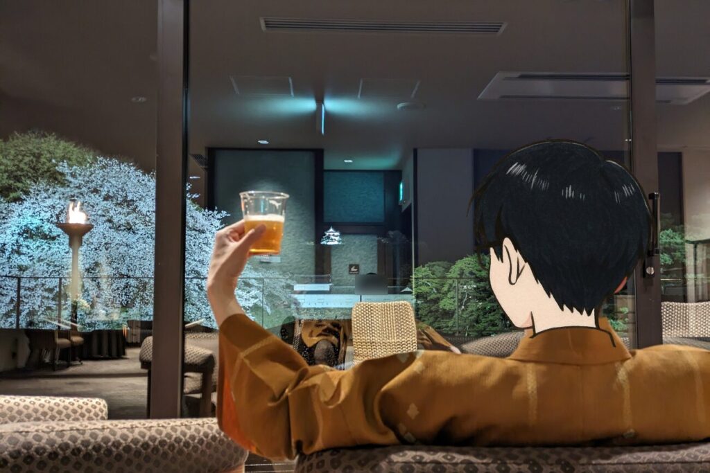 彦根キャッスル リゾート&スパのラウンジでビールを飲む私