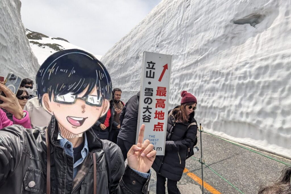 雪の大谷で記念撮影